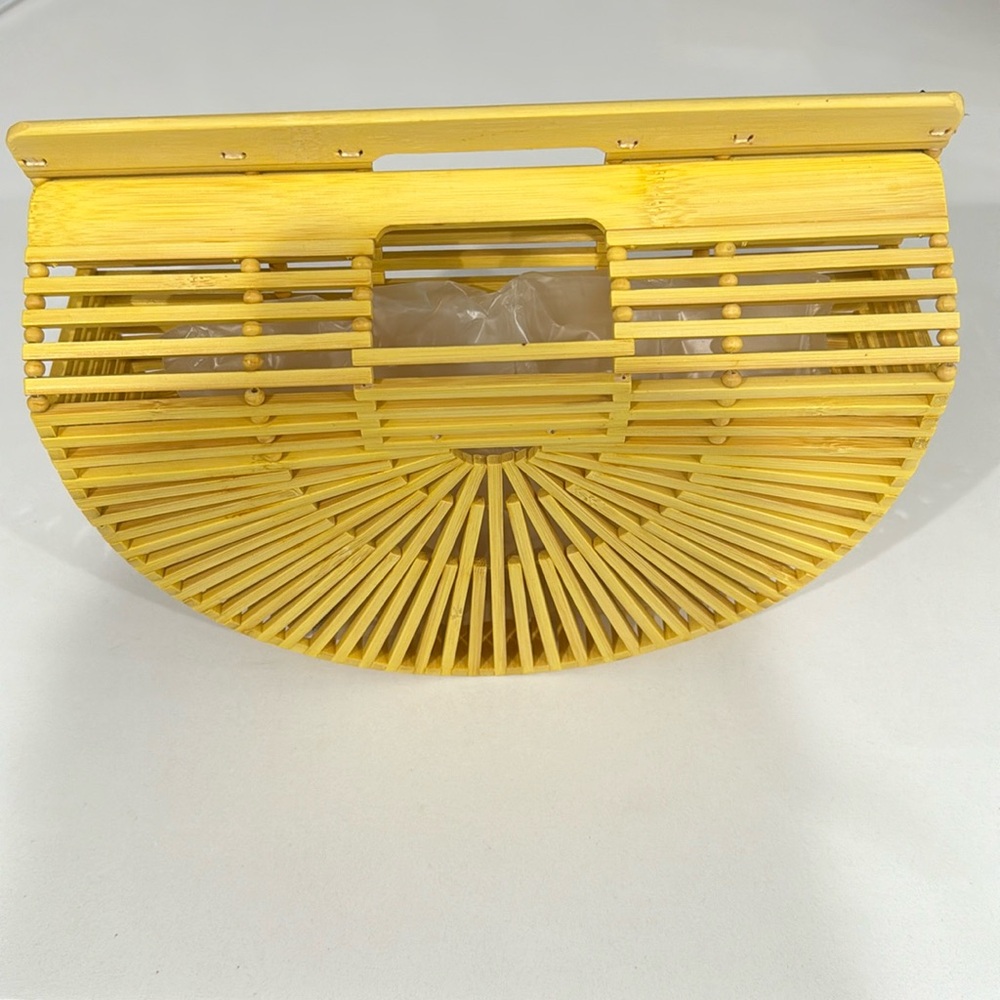 Brand new- Bright bucket bag “yellow” woof clutch